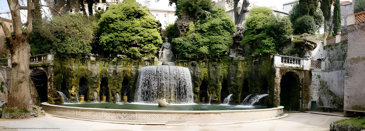 Fuente de jardín entre arcos y musgo