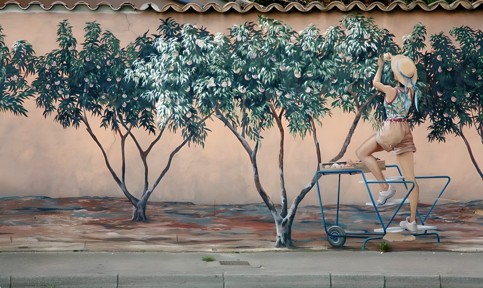TPES99910: Mural de una joven recogiendo fruta