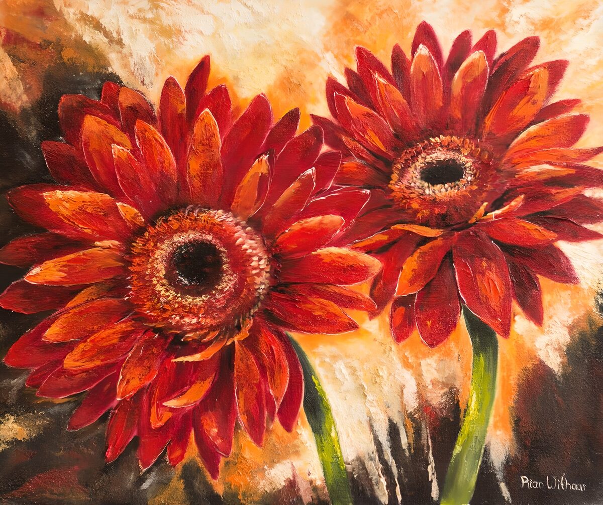 Dos gerberas en rojo y naranja vibrantes