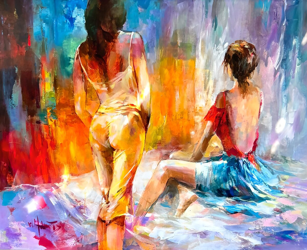 Dos mujeres de espaldas en rojo y crema